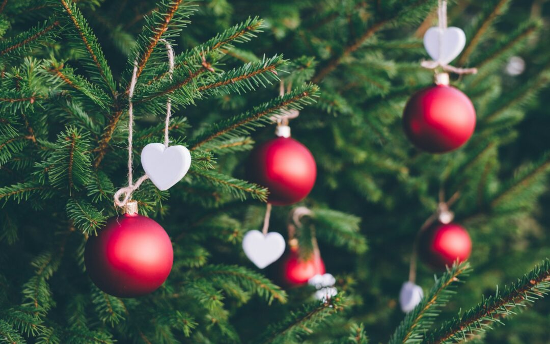 green Christmas tree with red ornaments