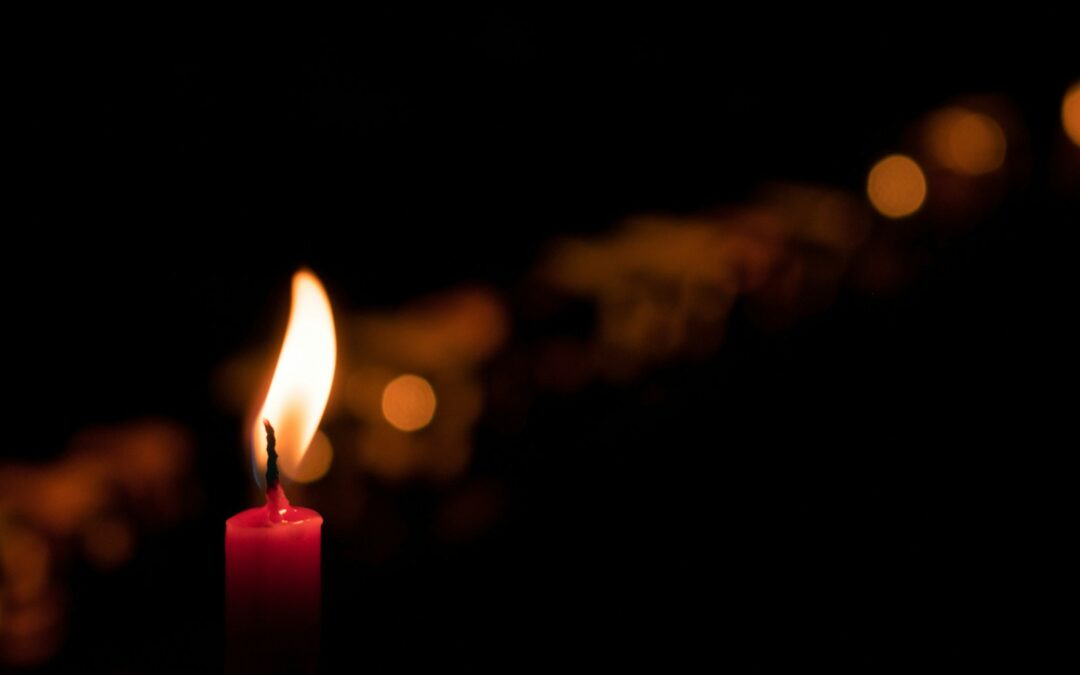 selective focus photography of red candle