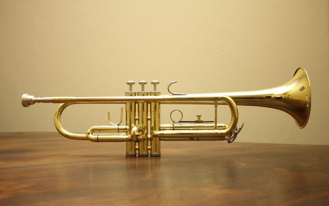 brass-colored trumpet