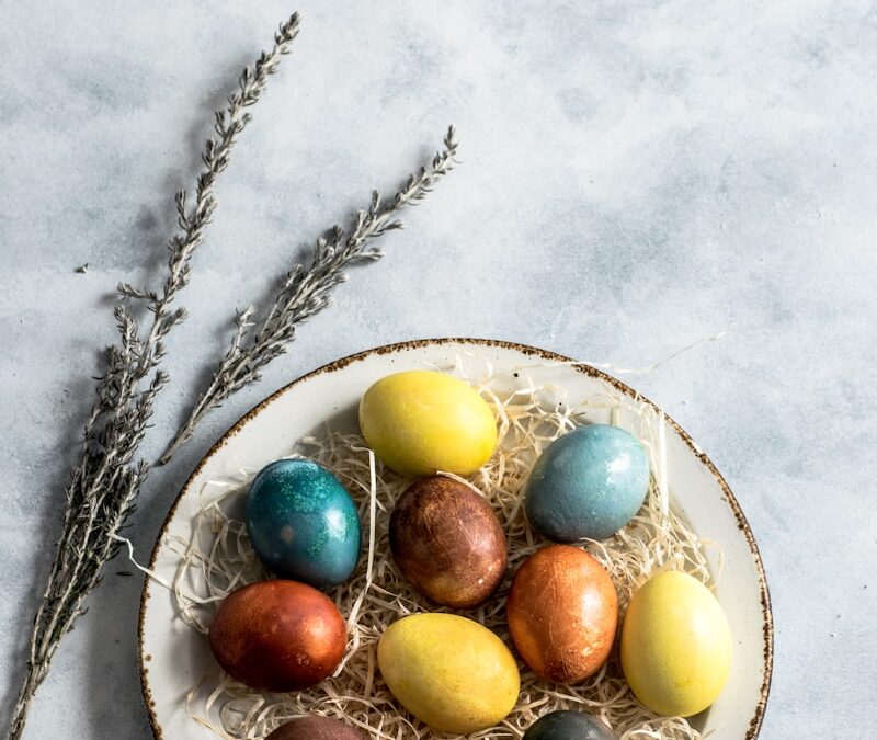 assorted-color eggs on white ceramic tray