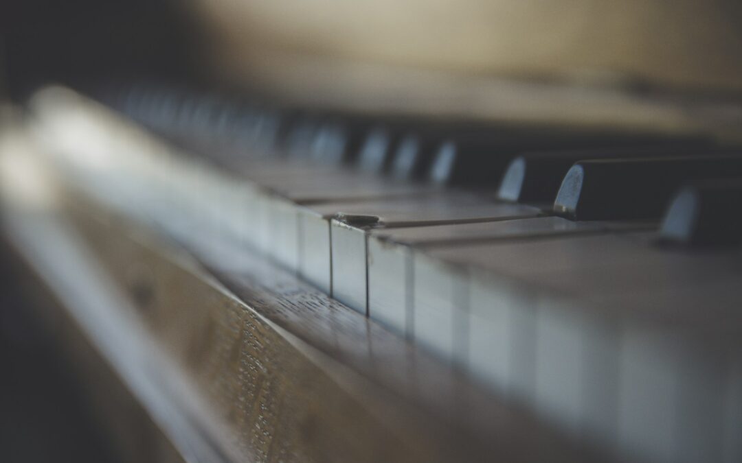 brown wooden framed piano