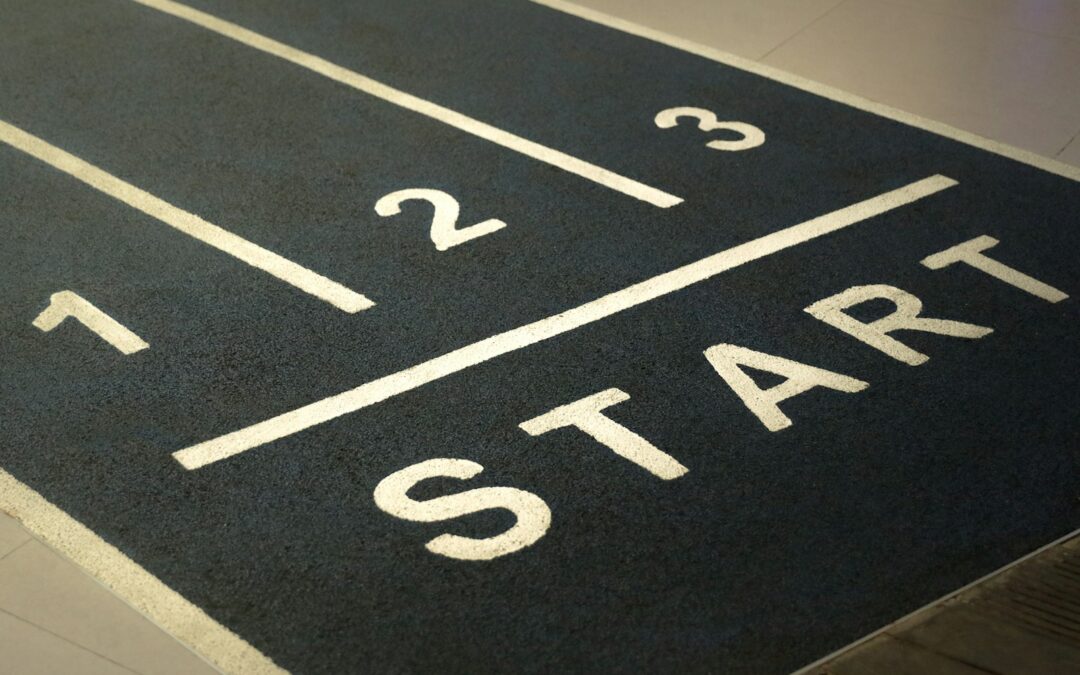 a close up of a street sign on the ground
